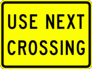 USE NEXT CROSSING (W10-14a)